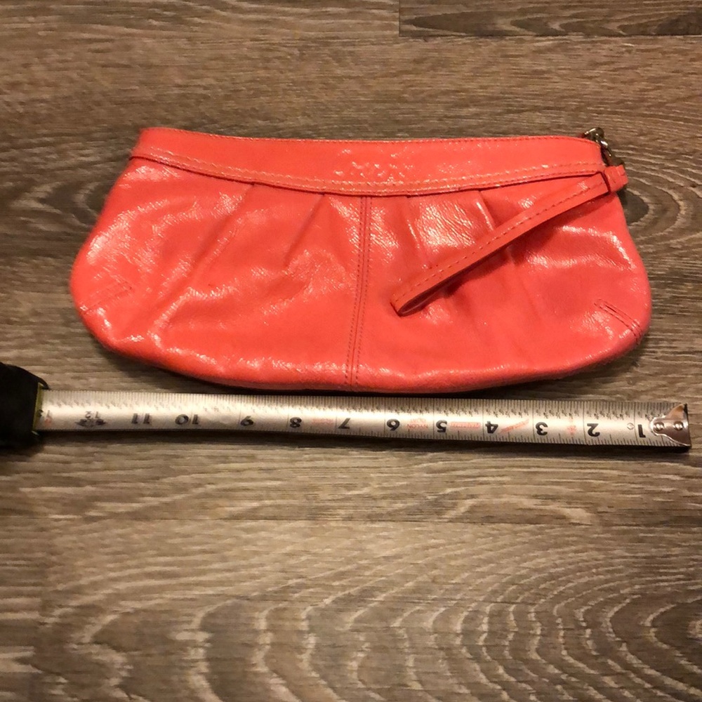 Authentic Coach Coral high shine leather clutch